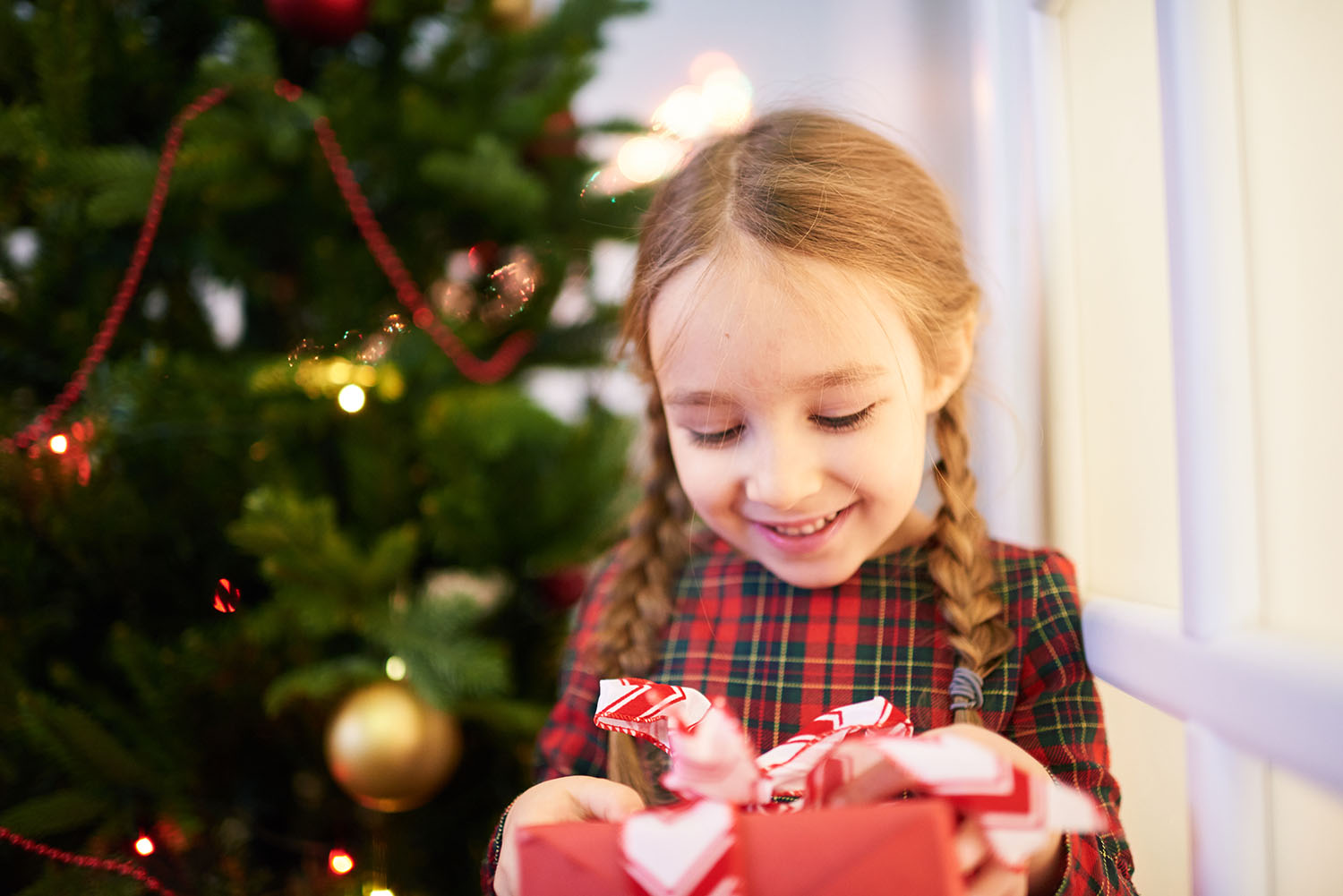 Opening Christmas Gift